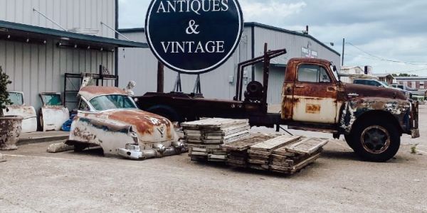 Exterior of Antique store with old rusty truck parked out front in Forney TX