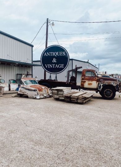 Exterior of Antique store with old rusty truck parked out front in Forney TX